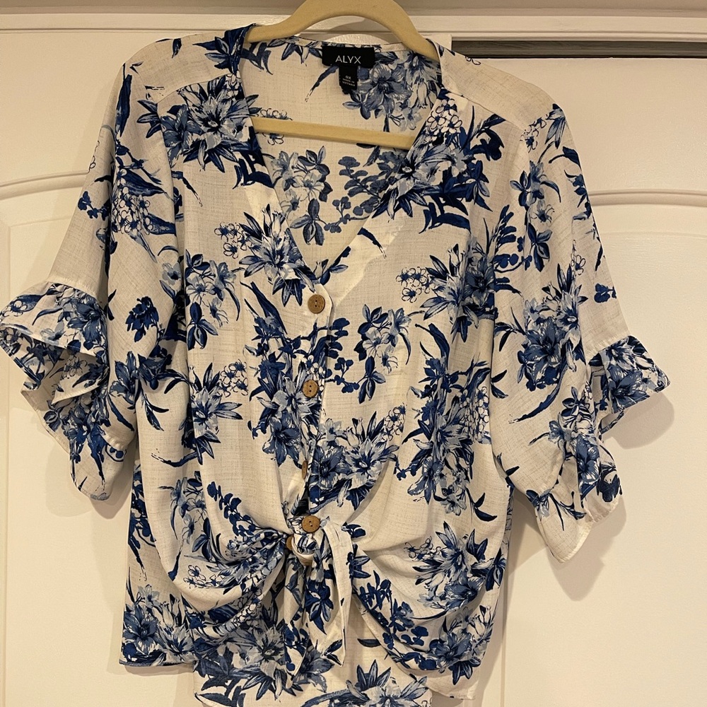 Floral short bell sleeve top.
